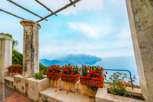 Coastline in southern Italy, vertiginous cliffs adorned with colorful villages, turquoise waters. Villa Rufolo in Ravello on Amalfi Coast in Italy. photo