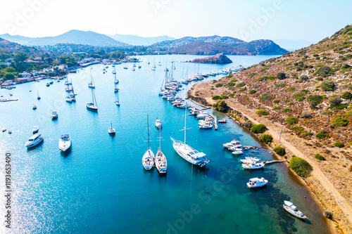 Fototapeta Naklejka Na Ścianę i Meble -  Aerial view of Gumusluk, Bodrum. Mugla, Turkey. Gumusluk Bay (Myndos) panoramic view. Drone shot.