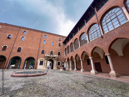 Cortile del Tribunale town square and Palazzo di Cansignorio building with no people in Verona, Italy photo