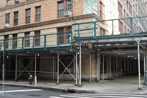 scaffolding surrounding a pre-war residential apartment building on the uppwer west side of Manhattan, New York