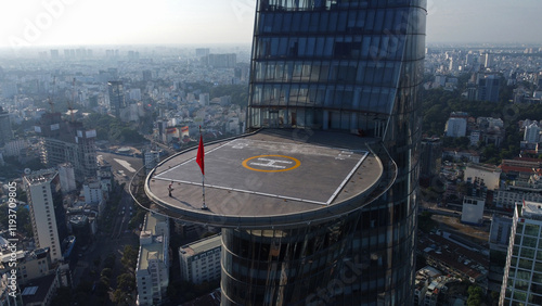 Aerial view of the futuristic skyscraper and his helipad inspired by a Lotus flower design in Ho Chi Minh City, Vietnam.