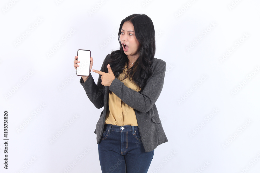 Woman is pointing at mobile phone with blank screen. Business asian woman Woman is pointing at mobile phone with blank screen. Business asian woman