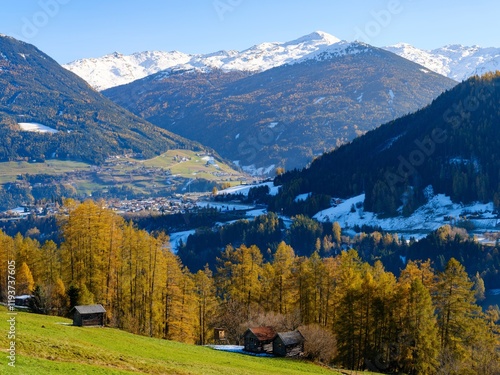 View towards Wipptal (valley Wipp) and the Brenner motorway. Autumn at the Telfer Wiesen in the valley Stubai. Austria, Tyrol photo