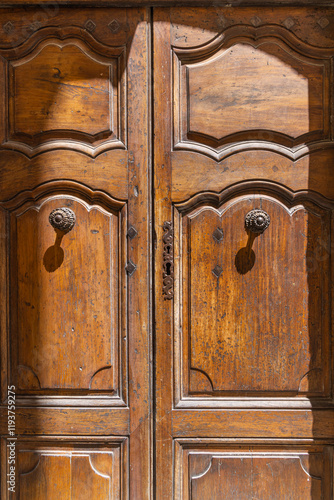 Gordes, Vaucluse, Provence-Alpes-Cote d'Azur, France. An old wooden door in Provence. photo