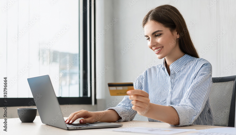Young woman online shoping with credit card on laptop. Female freelancer connecting to internet via computer. Young woman online shoping with credit card on laptop. Female freelancer connecting to internet via computer.