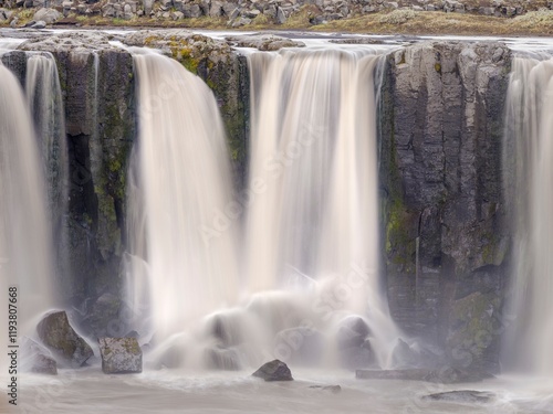 Waterfall Selfoss in the Vatnajokull National Park. Selfoss is the first of several waterfalls of river Jokulsa a Fjollum in the canyon Jokulsargljufur. Iceland photo