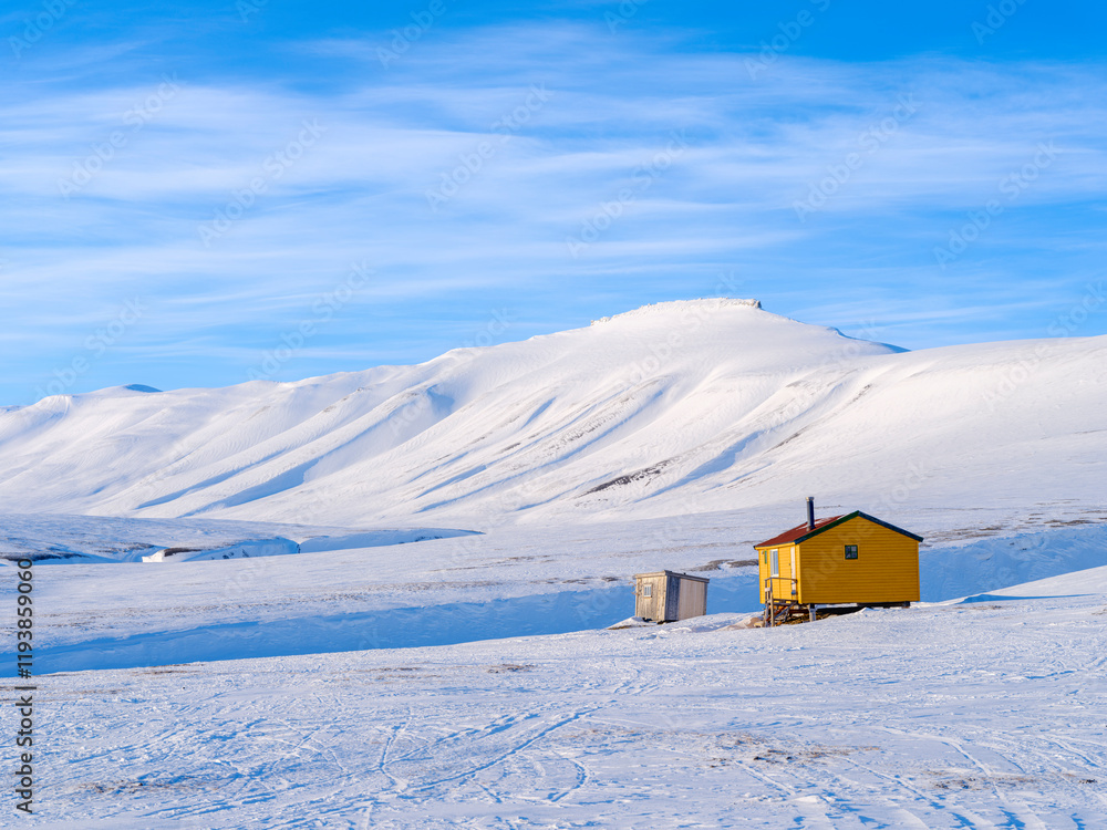 Huts called Semmelbu. Valley Semmeldalen during winter, Van Mijenfjorden National Park, on the island of Spitsbergen in the Svalbard Archipelago. Arctic, Norway. Huts called Semmelbu. Valley Semmeldalen during winter, Van Mijenfjorden National Park, on the island of Spitsbergen in the Svalbard Archipelago. Arctic, Norway.