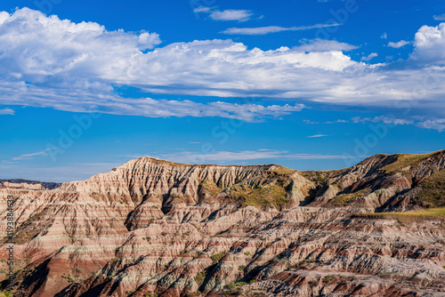 Rugged multi color plains, mountains and valleys of Badlands National Park near Wall, South Dakota photo