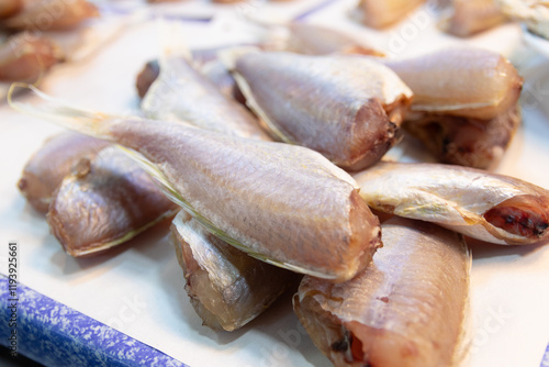 Sun Dried Ornate Threadfin Bream Fish at Market photo