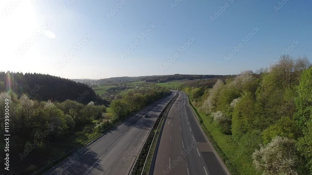 Aerial View of Cars driving along a Autobahn Road Aerial View of Cars driving along a Autobahn Road