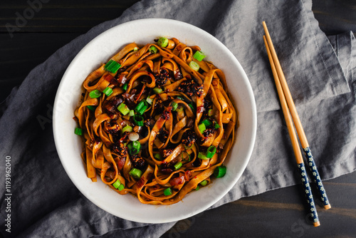 Obraz na plátně Shallot Chili Oil Noodles Served in a Ramen Bowl: Hot and spicy lo mein noodles