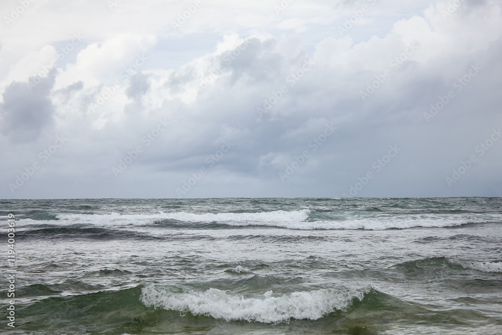 A tropical storm accompanied by rain came from the Indian Ocean accompanied by gloomy dark cloudy skies, turbulent sea waves around the coast. A tropical storm accompanied by rain came from the Indian Ocean accompanied by gloomy dark cloudy skies, turbulent sea waves around the coast.