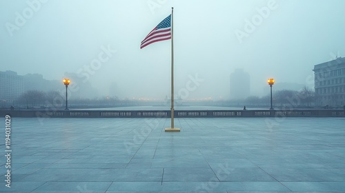 Foggy scene with an American flag and empty plaza.