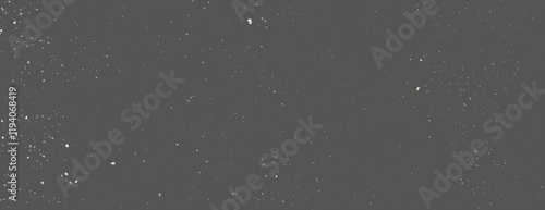Dark gray background with a speckled texture. The gray background features scattered white specks, creating a starry effect. Speckled wall texture background. Gray background vector.