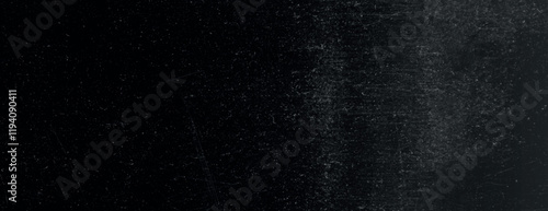 Dark black background with a textured, scratched surface. The black background gives a gritty, industrial feel with subtle variations. Minimal grunge paper texture vector background