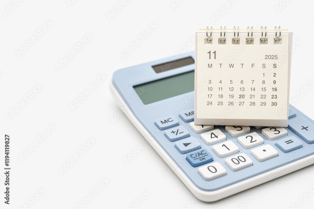 Desk calendar for NOVEMBER 2025 on calculator. Calendar concept with copy space. 2025 NOV calendar. calculator and forecast for finances in 2025. Money, Budget, investment and financial. Desk calendar for NOVEMBER 2025 on calculator. Calendar concept with copy space. 2025 NOV calendar. calculator and forecast for finances in 2025. Money, Budget, investment and financial.