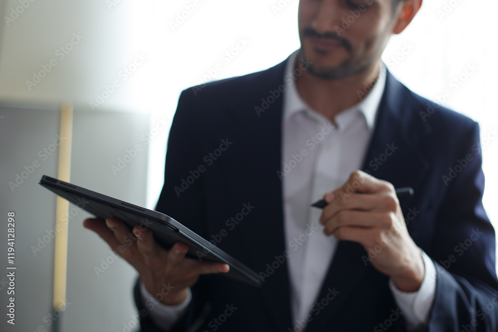 Closeup of digital tablet, successful businessman pointing typing touchpad working at office. Closeup of digital tablet, successful businessman pointing typing touchpad working at office.