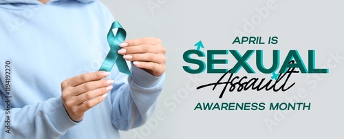 Young woman with teal ribbo...