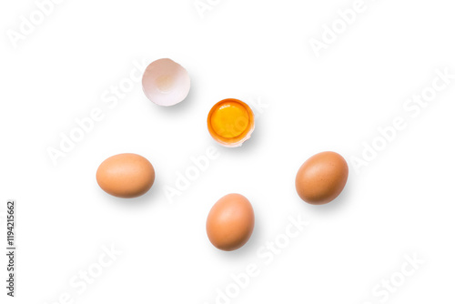 Closeup of brown organic free-range chicken eggs with broken egg isolated on a transparent background with shadow from above, top view