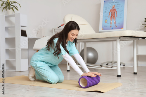 Female physiotherapist with...