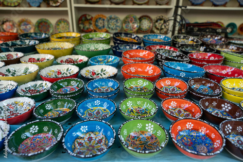 Canvas Print A table full of colorful bowls with flowers and other designs