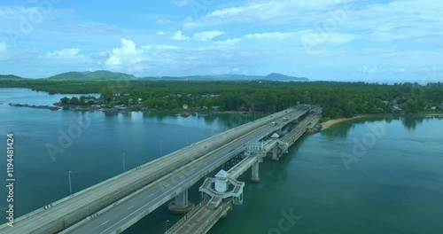 Wallpaper Mural Aerial view beautiful Sarasin bridge on the blue sea.
Sarasin bridge is important route connecting by land.
Scene of white cloud in blue sky and green sea.
the bridge connect Phuket to Phang Nga. Torontodigital.ca
