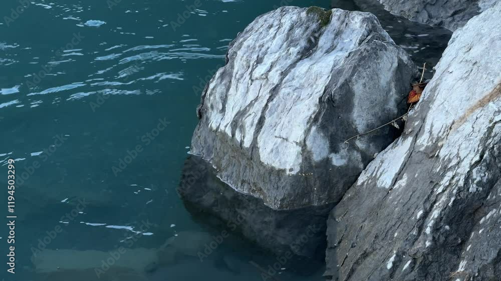 Giant stone Walensee Lake Walen Switzerland clear clean glacier water nature Giant stone Walensee Lake Walen Switzerland clear clean glacier water nature