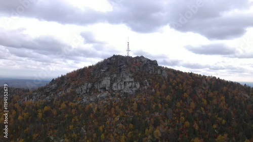 Flight around the big forest rock Polyd