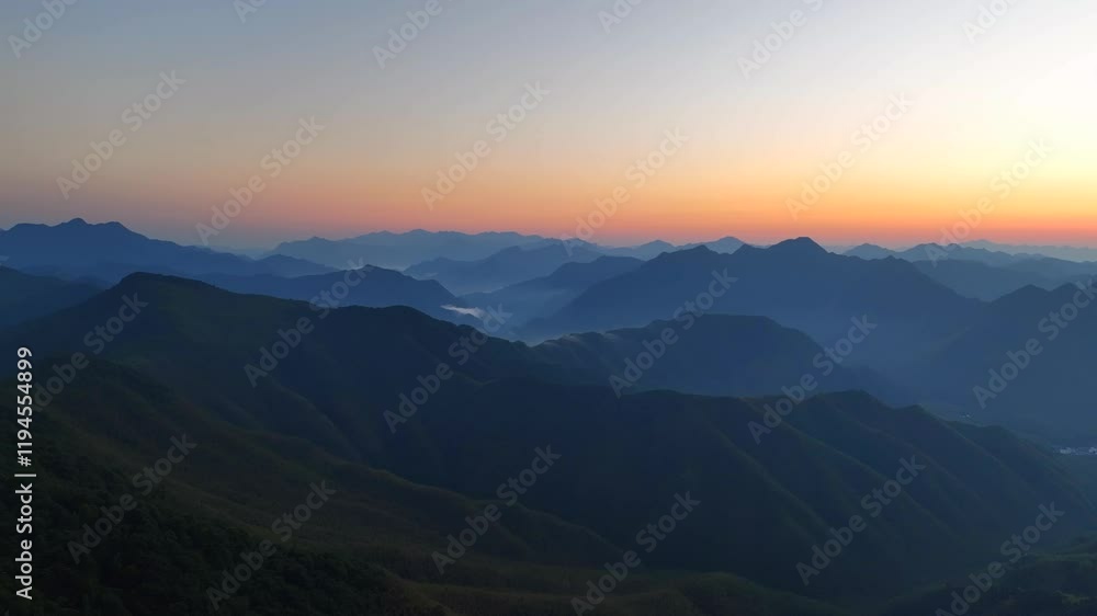 Breathtaking sunrise over majestic mountains captured through ink painting and aerial photography Breathtaking sunrise over majestic mountains captured through ink painting and aerial photography