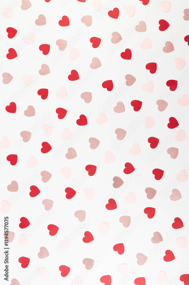 Top view of colorful hearts on white background. Pink glitter hearts, red hearts, pink hearts. Valentine's day, love wallpaper. Flat lay, copy space. Top view of colorful hearts on white background. Pink glitter hearts, red hearts, pink hearts. Valentine's day, love wallpaper. Flat lay, copy space.