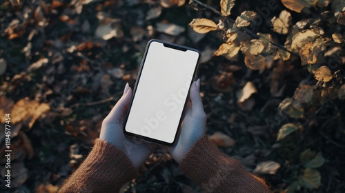 A technology-focused photo of a smartphone with a blank white screen in a womanâ€™s hand, styled for mockups and minimalist designs --ar 16:9 --v 6.1 Job ID: f00afd41-e3ee-42b5-a3f8-3946ddc725e2
