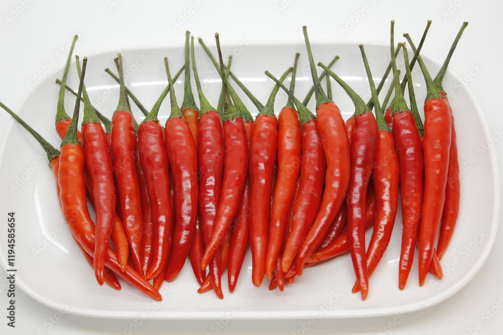 A group of red hot chili peppers and green hot chili peppers are ripe for bring to be a ingredient. A group of red hot chili peppers and green hot chili peppers are ripe for bring to be a ingredient.