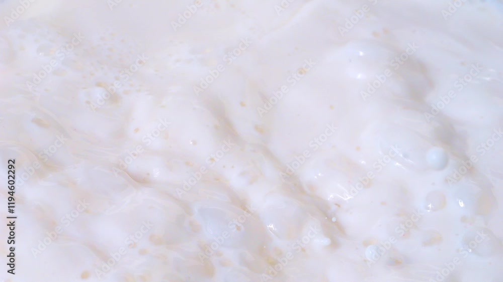 Raspberries falling into milk with splashes in slow motion 300fps Raspberries falling into milk with splashes in slow motion 300fps