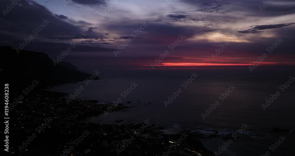 Forward Drone Shot Above Camps Bay at Twilight in Cape Town, South Africa Forward Drone Shot Above Camps Bay at Twilight in Cape Town, South Africa