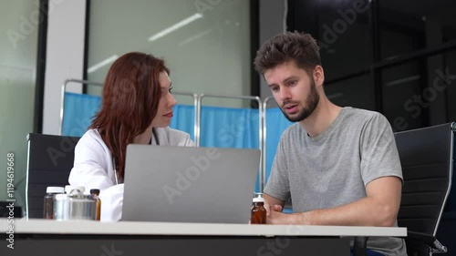 Doctor's hand reassuring patient and recommending treatment methods at the clini photo