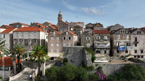 A charming view of Korčula’s historic stone homes, red rooftops, and serene coastal vibes