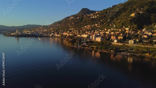 Aerial Cinematic Views of Veytaux: The Tranquil Shores of Lake Geneva, Switzerland. photo