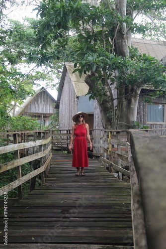 mulher em palafitas de hotel de selva em guarajá-mirim, rondonia photo