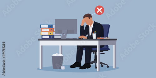 Exhausted businessman working in the office