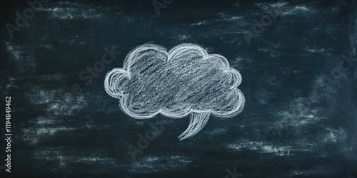 Thought bubble drawn in white chalk on a dark blackboard surface centered in the image with a textured background conveying creativity and contemplation photo