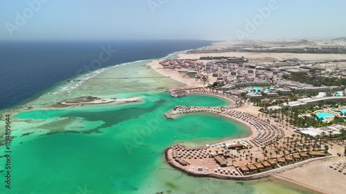 Makadi Bay, Egypt: Aerial view of Red Sea tourist resort near Hurghada, summer day with clear blue sky - landscape panorama of Europe from above
