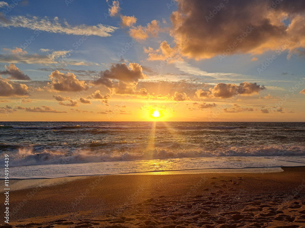 Fototapeta premium Seascape, Sunset over the sea. Sandy beach on the coast of Calabria, Italy