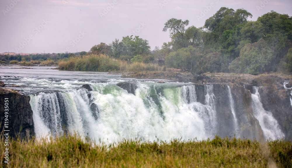 Fototapeta premium Victoria Falls, waterfall on the Zambezi River between Zambia and Zimbabwe. Africa