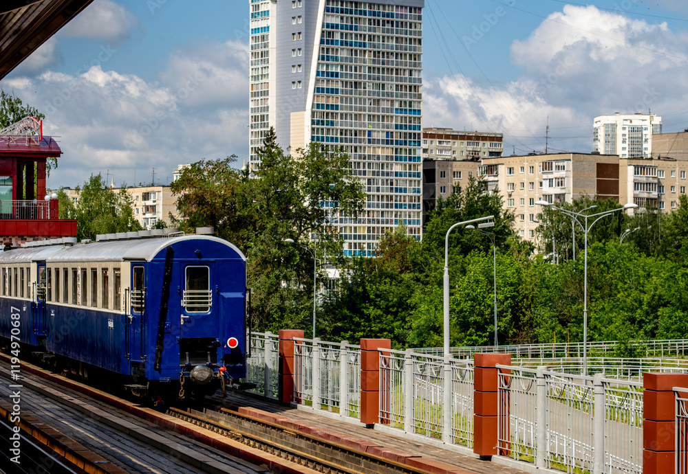 Naklejka premium The last carriage of the train at the railway station.
