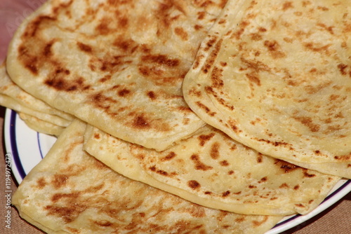 A close-up of the traditional Moroccan flatbread known as msemmen or msemen photo