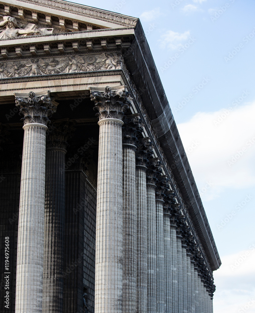 Madeleine Church Corinthian pillar row (Eglise de la Sainte-Marie-Madeleine, 1828) famous churches of Paris, France. Madeleine Church Corinthian pillar row (Eglise de la Sainte-Marie-Madeleine, 1828) famous churches of Paris, France.