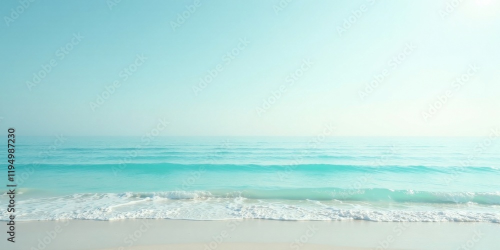 Obraz premium Serene Coastal Scene Gentle Waves Lap a Pristine Shoreline Under a Calm, Azure Sky