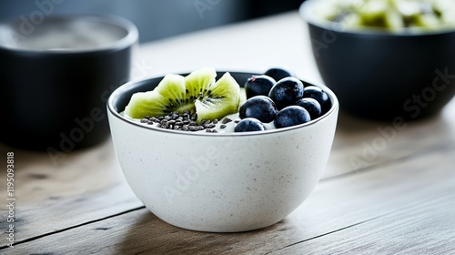 Elegant Close up of a nutritious smoothie bowl topped with fresh fruits seeds and a drizzle of honey on a wooden table rare self care practice healthy eating  photo