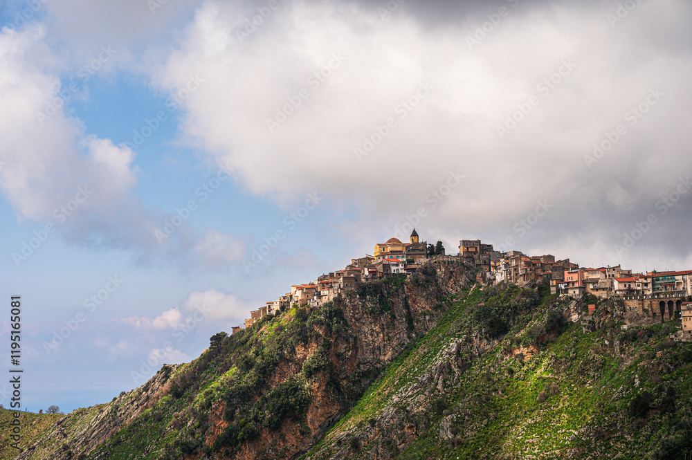 Naklejka premium top view of the village of Grisolia with a cloudy sky in the background, Cosenza