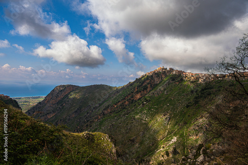 top view of the village of Grisolia with a cloudy sky in the background, Cosenza
